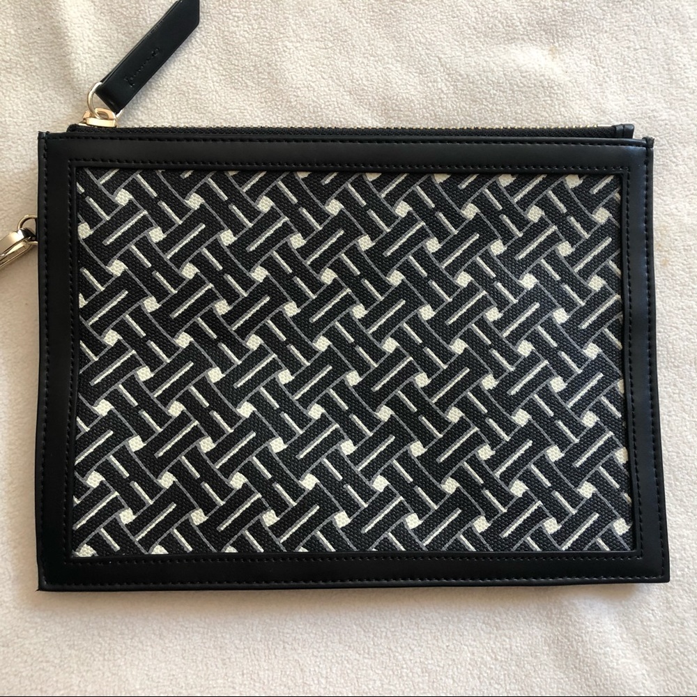 Cole Haan coated canvas and leather wristlet